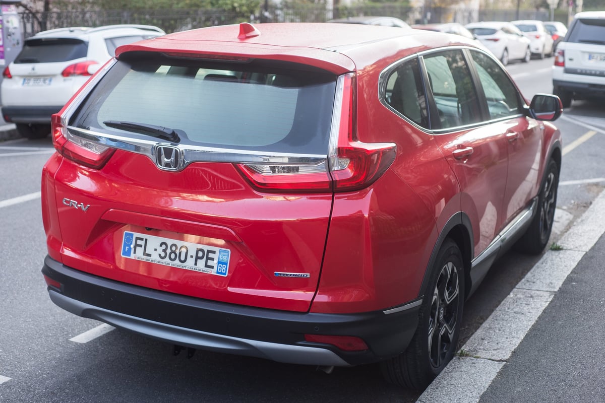 Mulhouse - France - 18 March 2020 - rear view of red Honda CRV crossover parked in the street