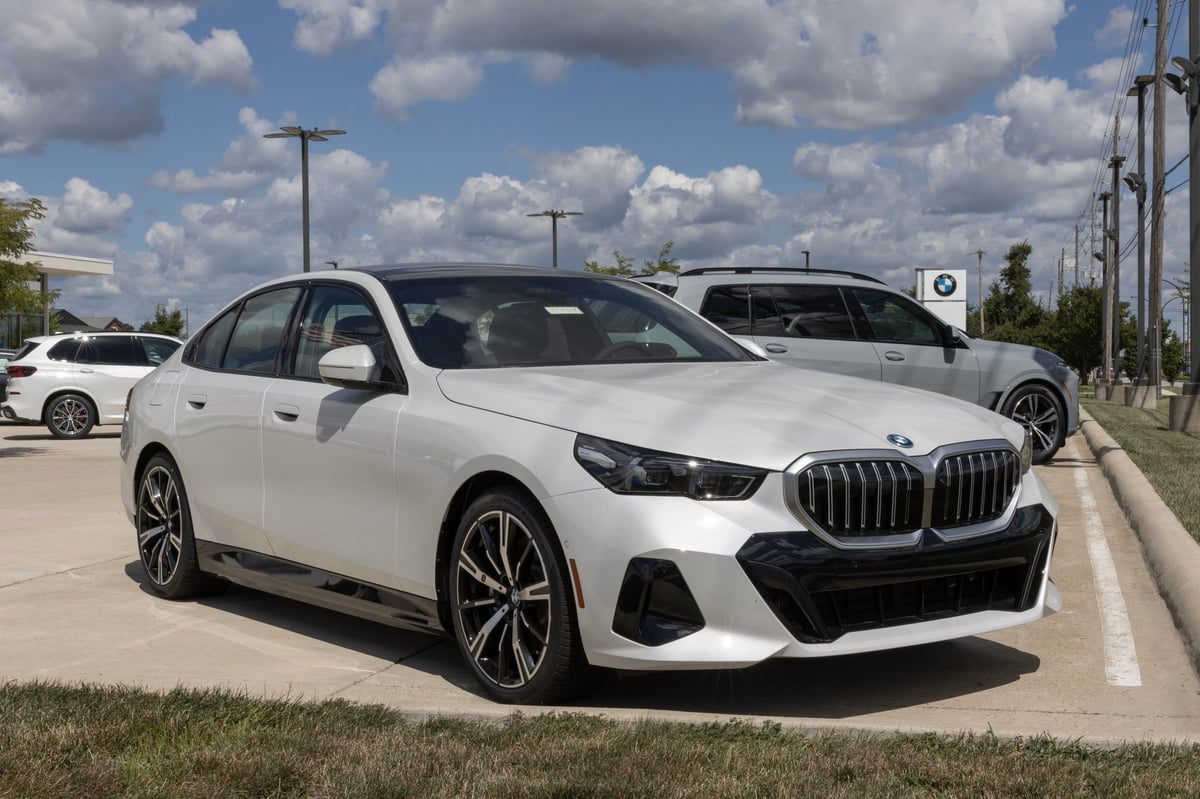 Lafayette - August 27, 2025: BMW 550e xDrive Sedan display at a dealership. BMW offers the 550e with a 3.0L Twin-Power Turbo PHEV hybrid engine.